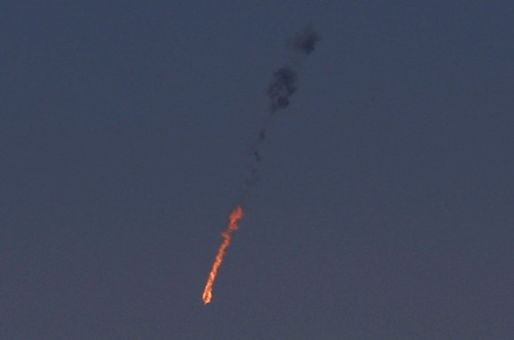 A Syrian aircraft in flames after being intercepted by Israel's military. Credit Jalaa Marey Agence France-Presse — Getty Images