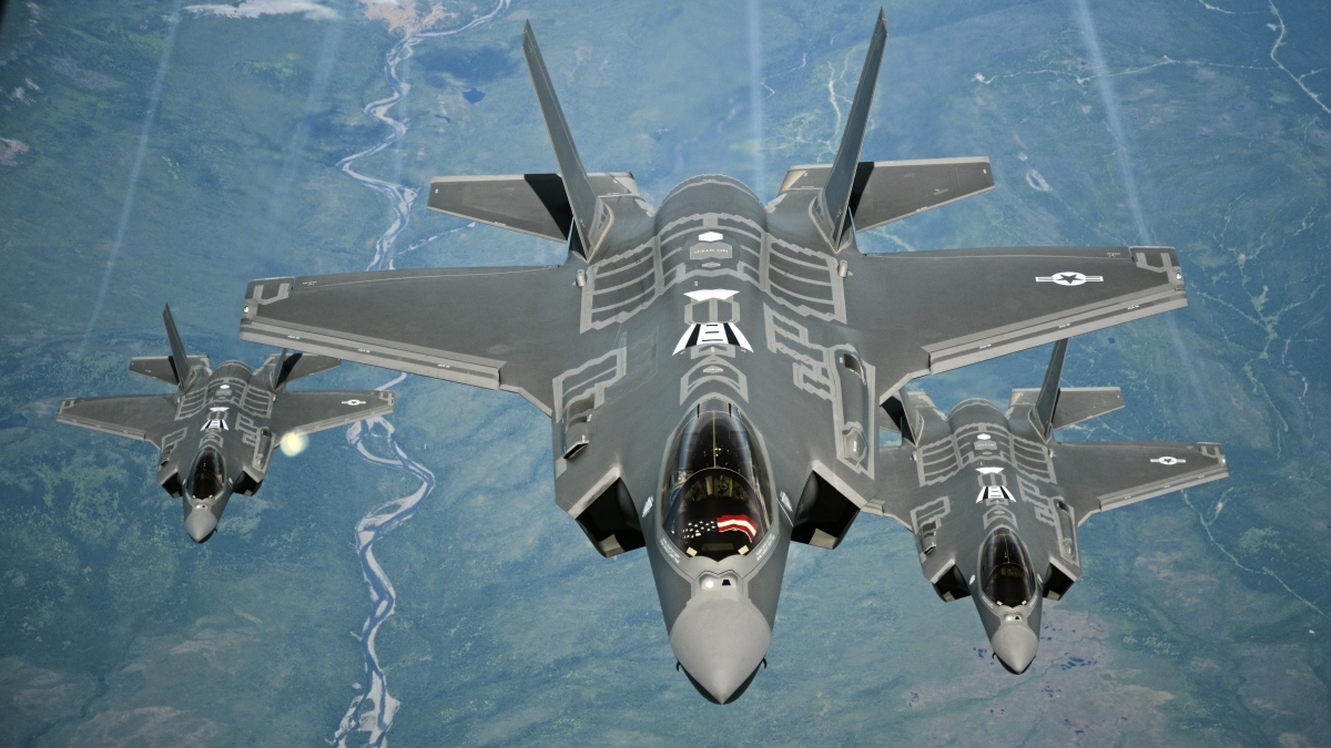 F-35A Lightning II aircraft receive fuel from a KC-10 Extender from Travis Air Force Base, Calif., July 13, 2015, during a flight from England to the U.S. The fighters were returning to Luke AFB, Ariz., after participating in the world's largest air show, the Royal International Air Tattoo. (U.S. Air Force photo/Staff Sgt. Madelyn Brown)