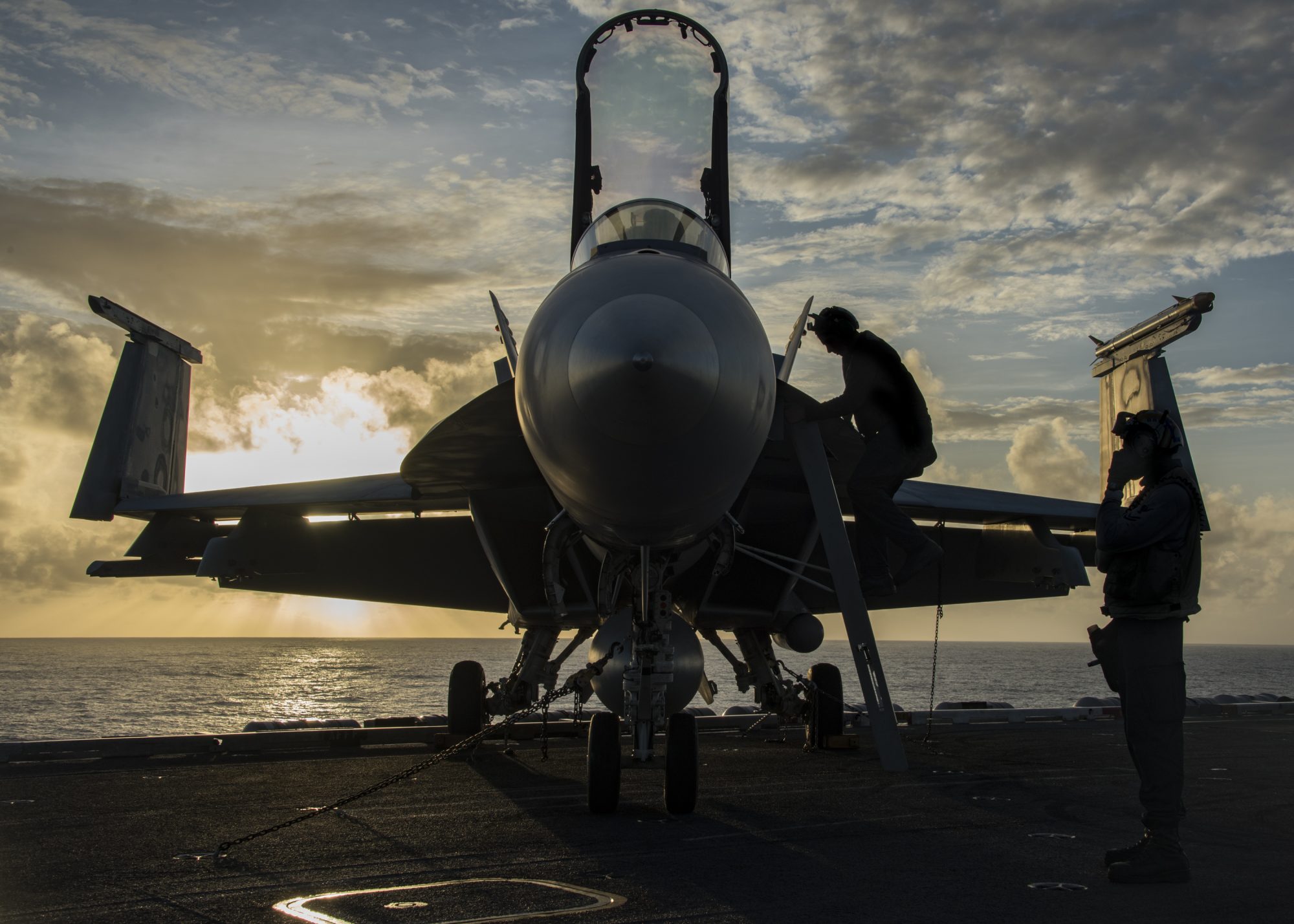 (Feb. 07, 2017) Sailors assigned to the “Kestrels” of Strike Fighter Squadron (VFA) 137, perform checks on an F/A-18E Super Hornet before flight operations on the aircraft carrier USS Carl Vinson (CVN 70) flight deck. The ship and its carrier strike group are on a regularly scheduled Western Pacific deployment as part of the U.S. Pacific Fleet-led initiative to extend the command and control functions of U.S. 3rd Fleet. U.S. Navy aircraft carrier strike groups have patrolled the Indo-Asia-Pacific regularly and routinely for more than 70 years. (U.S. Navy photo by Mass Communication Specialist 2nd Class Sean M. Castellano/Released)