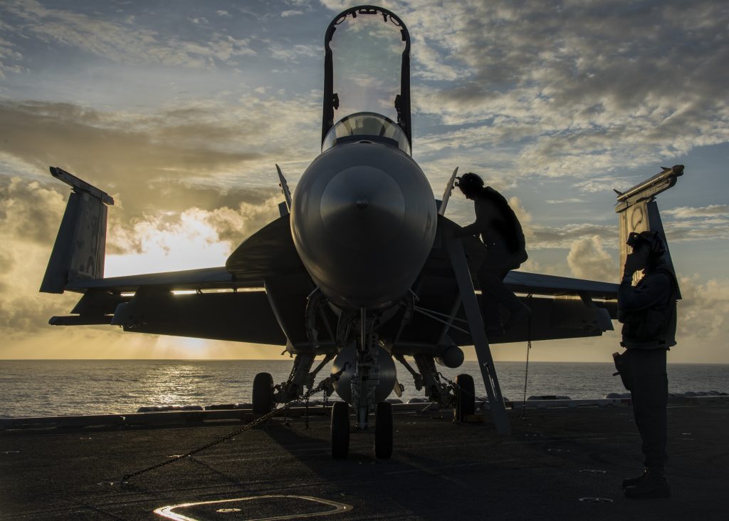(Feb. 07, 2017) Sailors assigned to the “Kestrels” of Strike Fighter Squadron (VFA) 137, perform checks on an F/A-18E Super Hornet before flight operations on the aircraft carrier USS Carl Vinson (CVN 70) flight deck. The ship and its carrier strike group are on a regularly scheduled Western Pacific deployment as part of the U.S. Pacific Fleet-led initiative to extend the command and control functions of U.S. 3rd Fleet. U.S. Navy aircraft carrier strike groups have patrolled the Indo-Asia-Pacific regularly and routinely for more than 70 years. (U.S. Navy photo by Mass Communication Specialist 2nd Class Sean M. Castellano/Released)